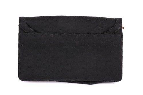 Lot 329 - Two Gucci bags and a Giorgio Armani handbag;...