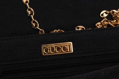 Lot 329 - Two Gucci bags and a Giorgio Armani handbag;...