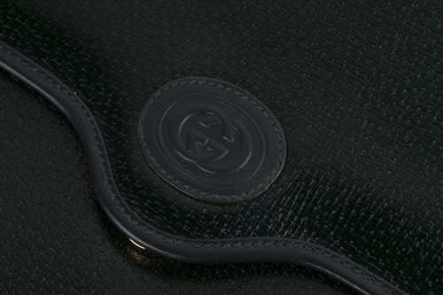 Lot 329 - Two Gucci bags and a Giorgio Armani handbag;...