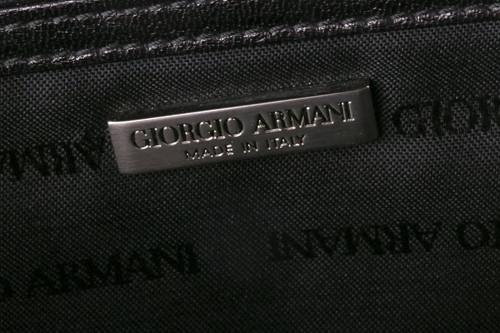 Lot 329 - Two Gucci bags and a Giorgio Armani handbag;...