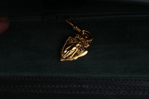 Lot 329 - Two Gucci bags and a Giorgio Armani handbag;...