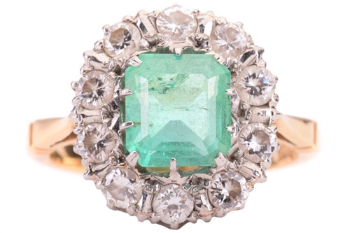 Lot 7 - An emerald and diamond cluster ring; the...