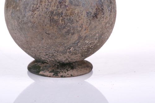 Lot 262 - A Roman glass inverted baluster flask with a...