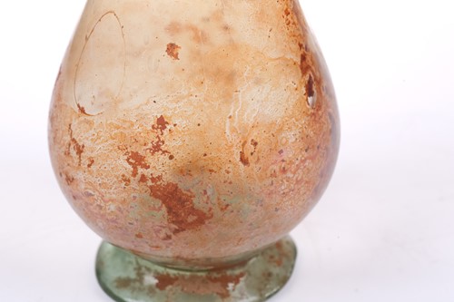 Lot 257 - A Roman glass inverted baluster form flask...