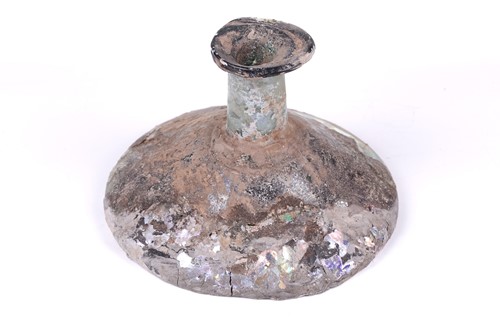 Lot 254 - A large Roman glass conical flask of spreading...