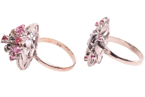 Lot 31 - Two floral cocktail rings set with ruby and...