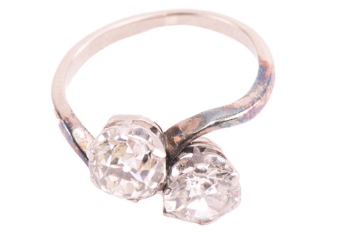 Lot 198 - A diamond two stone cross-over ring, set with...
