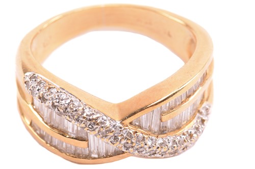 Lot 57 - A diamond crossover ring, set with...