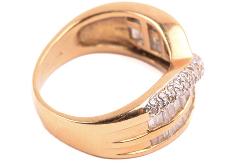 Lot 57 - A diamond crossover ring, set with...