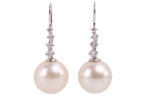 Lot 101 - A pair of South Sea pearl and diamond earrings,...