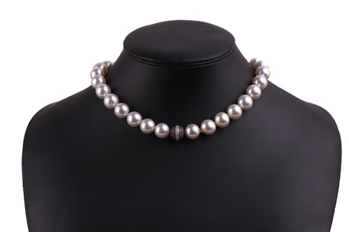 Lot 42 - A South Sea pearl necklace with a spherical...