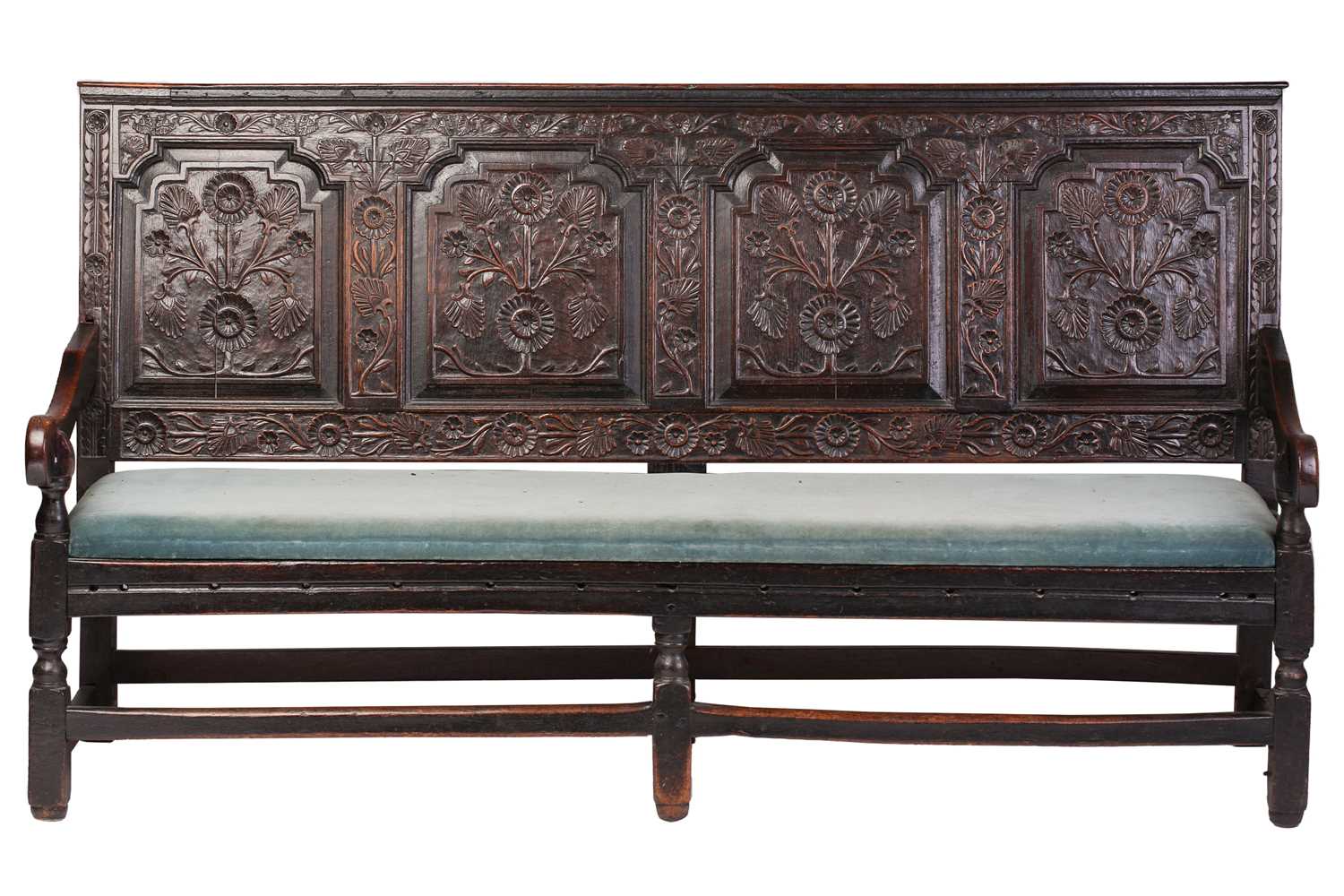 Lot 167 - An 18th century, oak settle with carved panel...