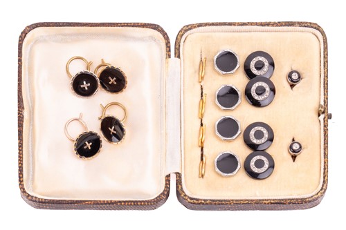 Lot 55 - An onyx and diamond dress set comprised of a...