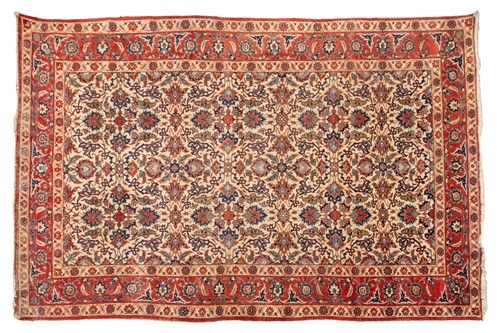 Lot 175 - An ivory-ground Najafabad carpet with overall...