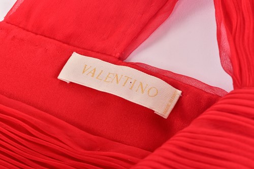 Lot 67 - Valentino; a red chiffon full length evening...