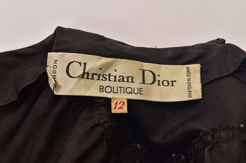 Lot 103 - Christian Dior; a black and embroidered long...