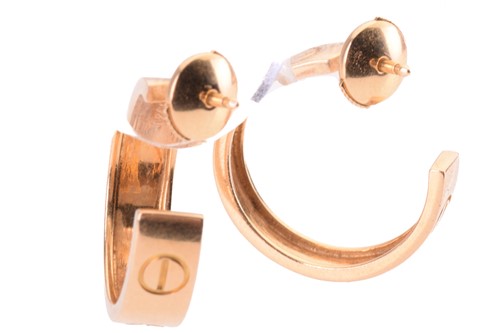 Lot 53 - A pair of Cartier 'Love' earrings, each of...