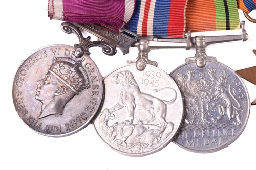 Lot 354 - A mid-20th century medal group, with Army...