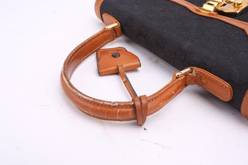 Lot 17 - Gucci - two shoulder bags and a handbag, circa...
