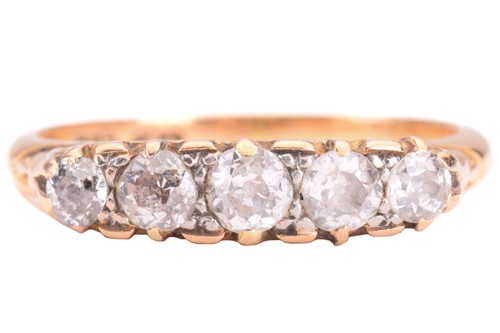 Lot 9 - A diamond five stone carved half hoop ring,...