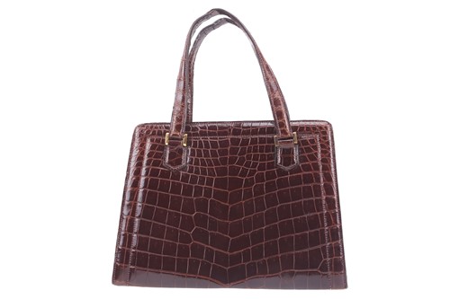 Lot 19 - Hermès - a 'Pullman' handbag in brown...