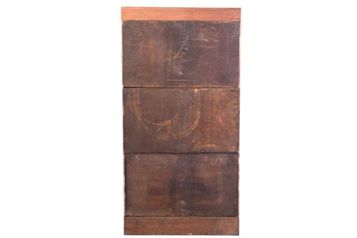 Lot 145 - An "ADDRESSOGRAPH" modular oak flight of...