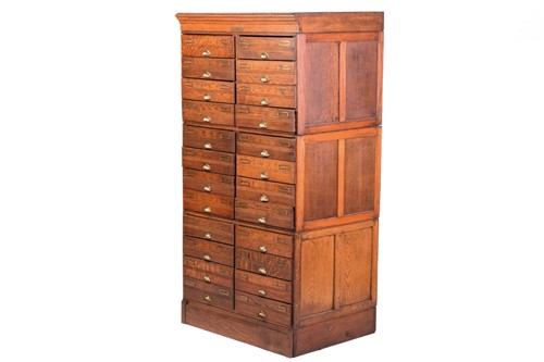 Lot 145 - An "ADDRESSOGRAPH" modular oak flight of...