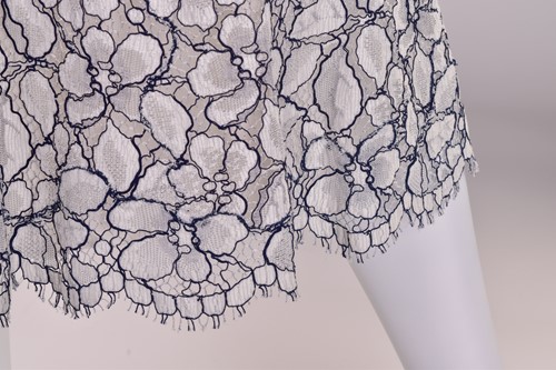 Lot 99 - Catherine Walker - a two-piece lace co-ord...