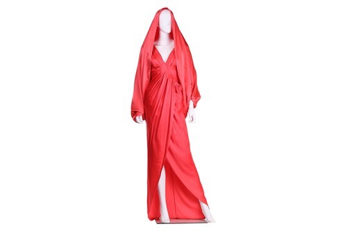 Lot 70 - A bright coral-coloured hooded full-length...