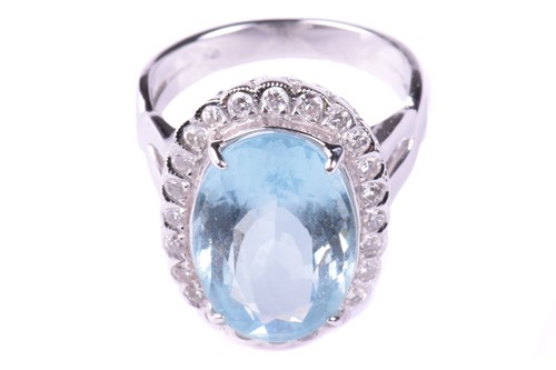 Lot 24 - An aquamarine and diamond cluster ring, set...
