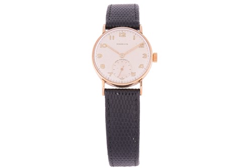 Lot 432 - A 9ct gold Marvin dress watch, featuring a...