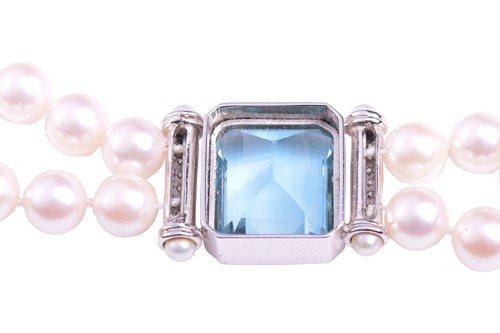 Lot 211 - An aquamarine, diamond and cultured pearl...