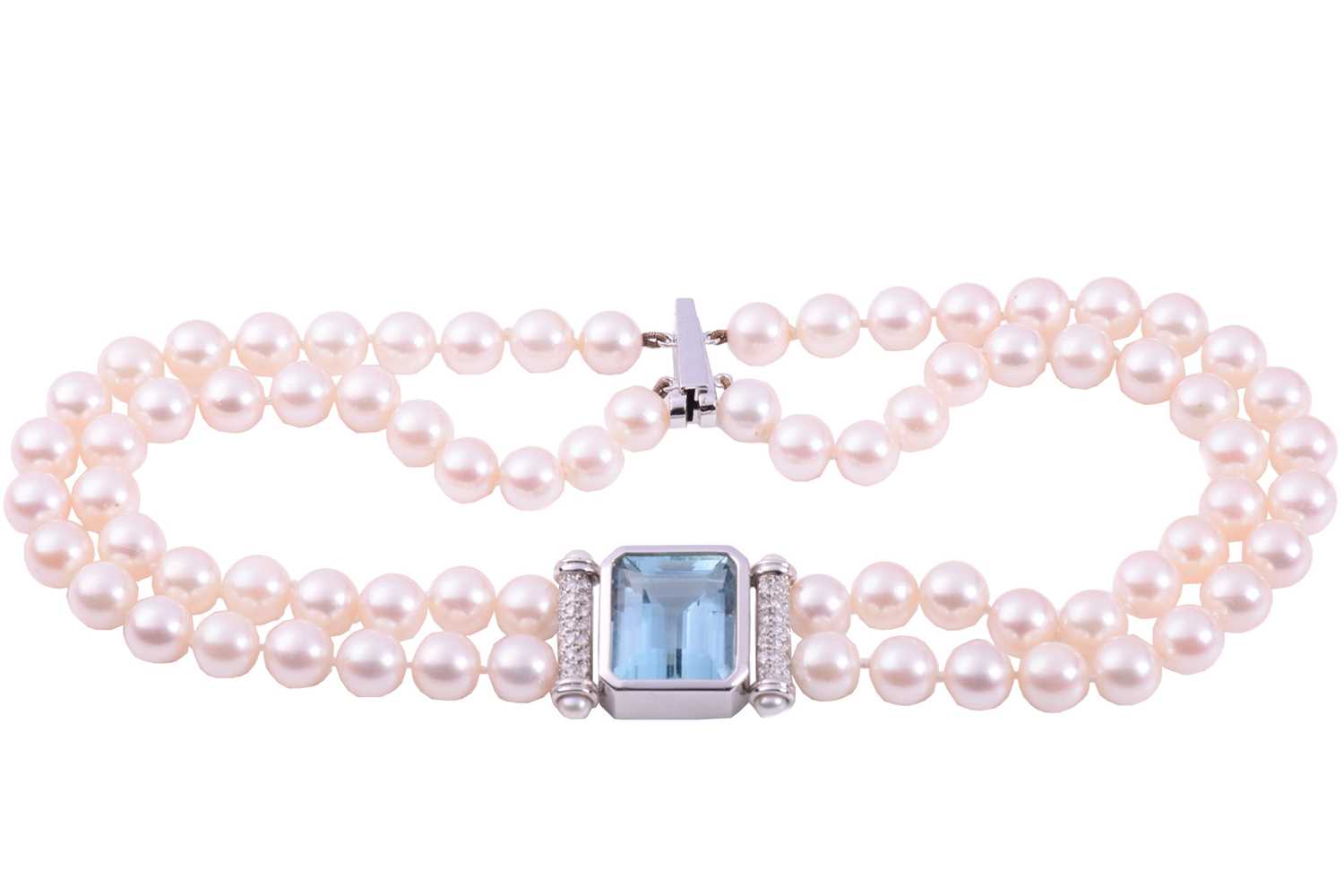 Lot 211 - An aquamarine, diamond and cultured pearl...