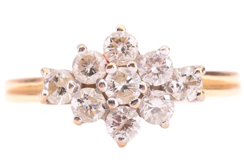 Lot 214 - A diamond cluster ring, set with round...