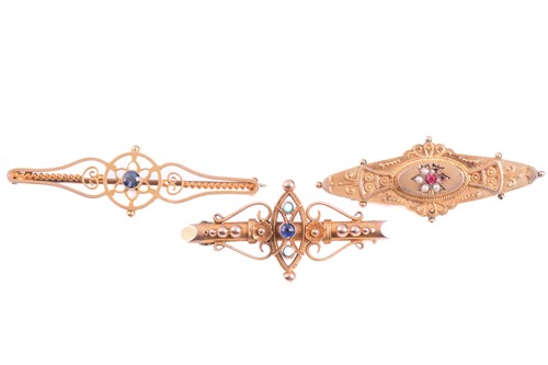 Lot 89 - A collection of three brooches, comprising a...