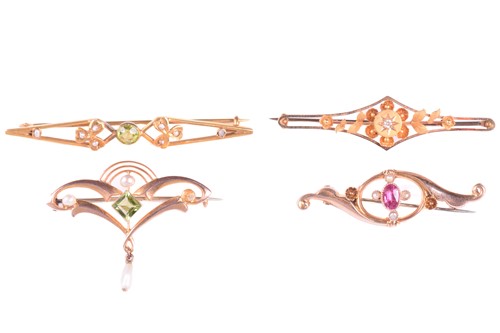 Lot 179 - Four Edwardian gem-set bar brooches; the first...