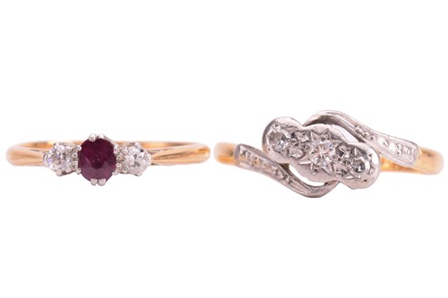 Lot 169 - A ruby and diamond three-stone ring, the ruby...