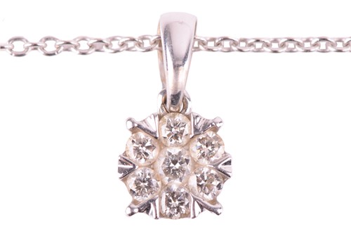 Lot 267 - A diamond set cluster pendant, featuring x7...