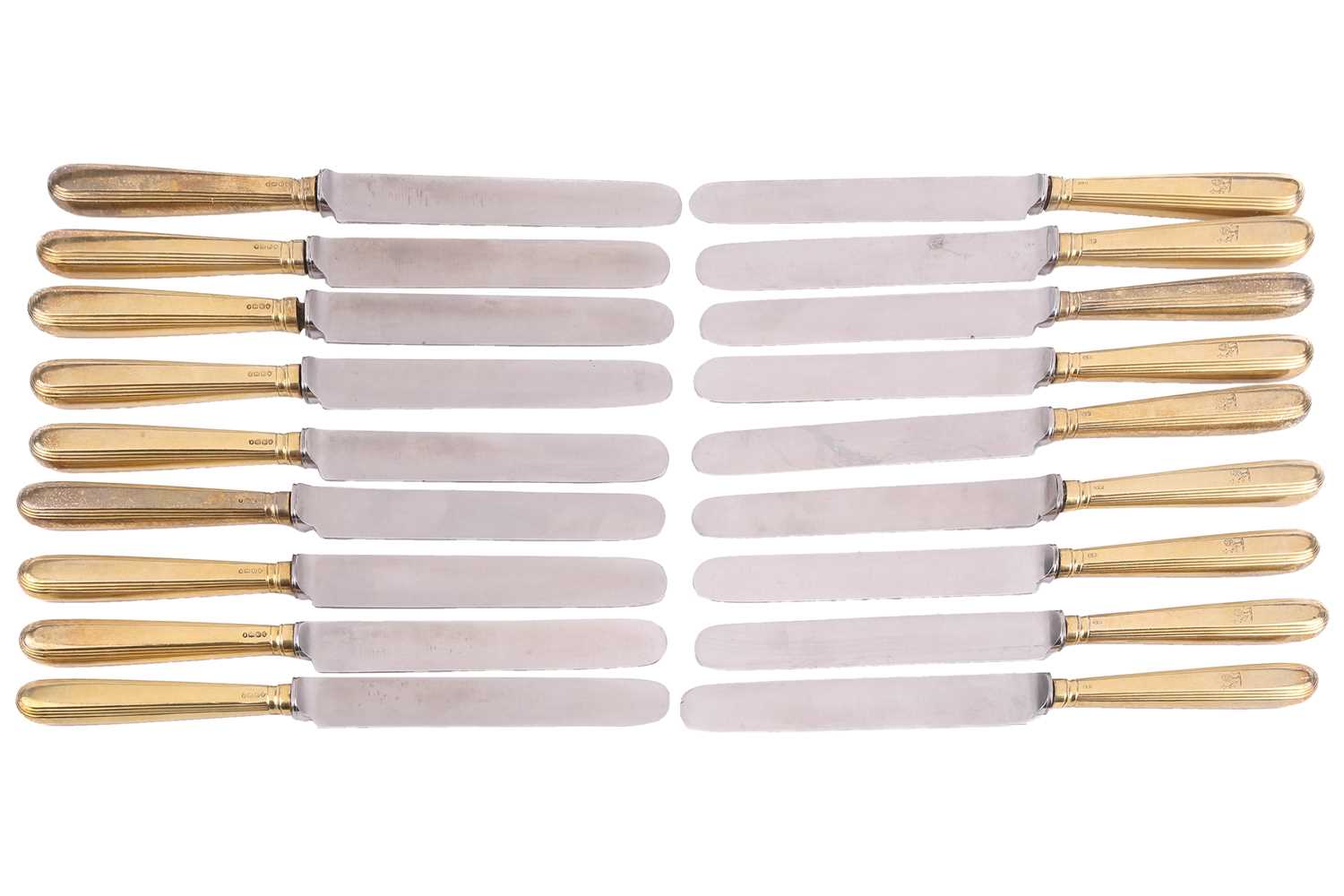Lot 498 - A set of eighteen William IV silver gilt...
