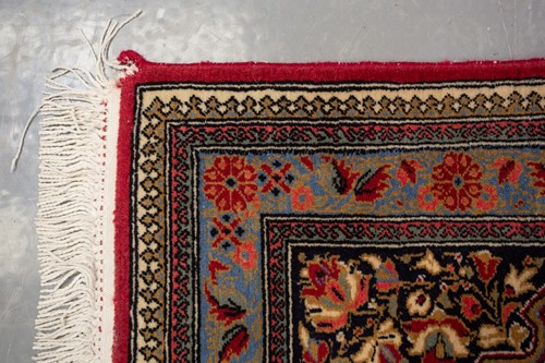 Lot 155 - An ivory ground Kerman strip runner with three...