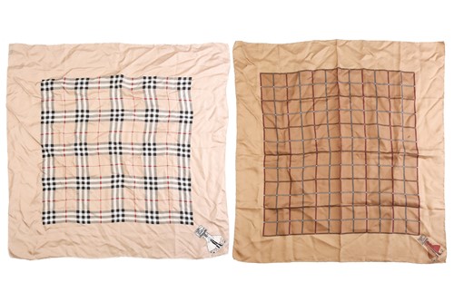 Lot 134 - Burberry - two check silk square scarves in...