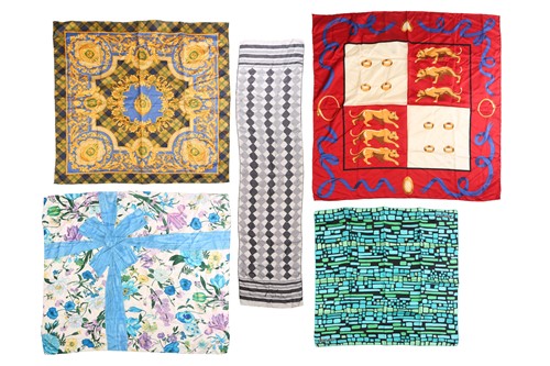 Lot 142 - Five printed silk square scarves, including...