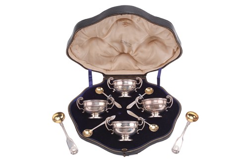 Lot 539 - A cased set of four silver salts with spoons;...