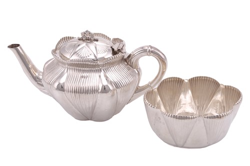 Lot 493 - A Victorian bachelor tea pot, oval with ribbed...