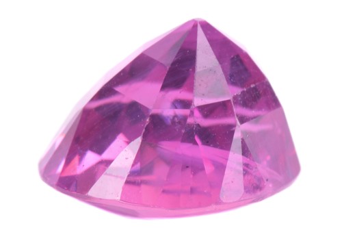 Lot 337 - A 5.10ct cushion shape pink sapphire,...