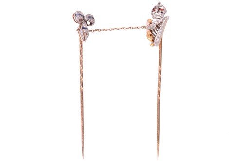 Lot 160 - Two diamond set stick pins; a crowned heart...