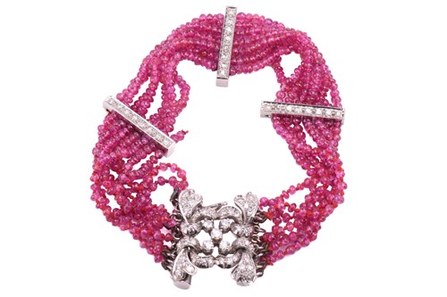 Lot 126 - A ruby bead bracelet with a diamond-set clasp,...