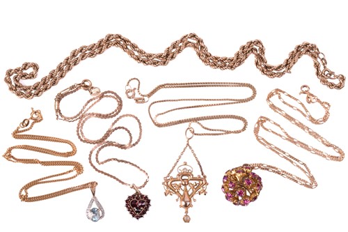 Lot 32 - A collection of chains and pendants, featuring...