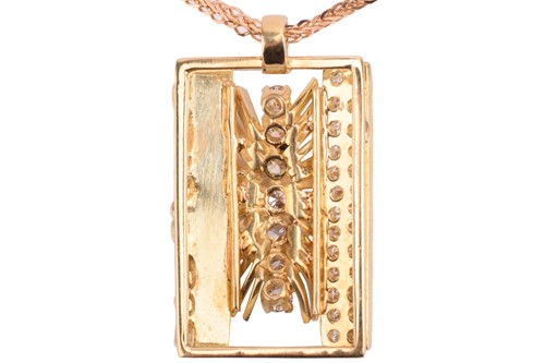 Lot 169 - A diamond set pendant, the rectangular plaque...