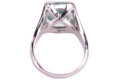 Lot 123 - A single stone aquamarine dress ring, the...